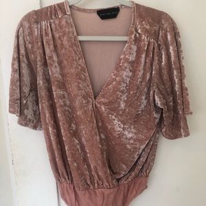 Pink velvet body suit